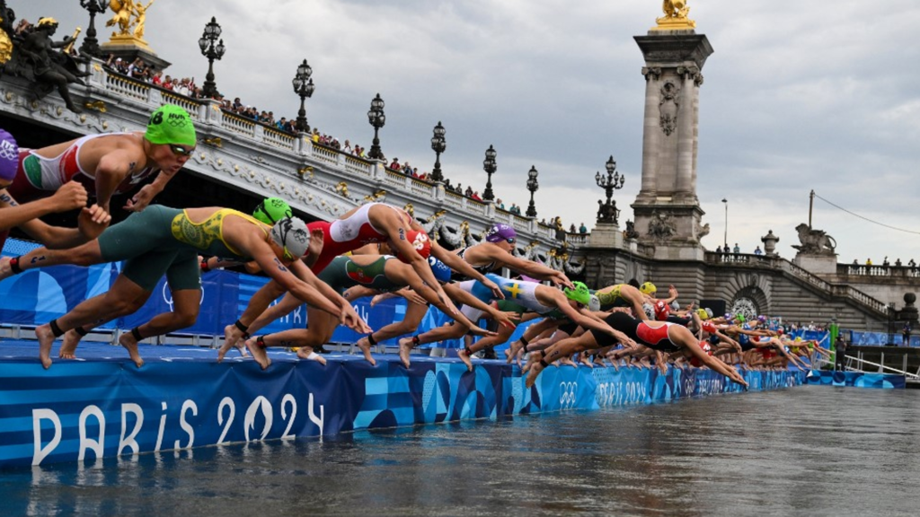 Swimmers Tapping Their Muscles: Science or Tarzan Tribute?